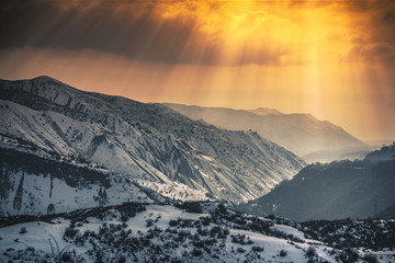 Beautiful sunset in the winter mountains