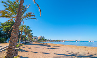 Ibiza sun shines of the beach in Sant Antoni de Portmany,  Take a walk along main boardwalk or in...