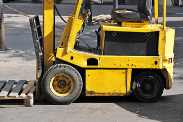 Yellow forklift truck