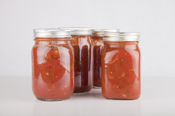 Fototapeta na wymiar Jars of homemade canned spaghetti sauce