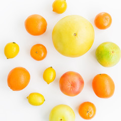 Fruits pattern - lemon, orange, grapefruit, sweetie and pomelo on white background. Fruit's background. Flat lay.