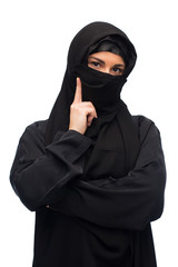 muslim woman in hijab over white background