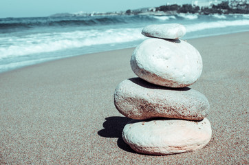 Fototapeta na wymiar Pebbles stack balance on the beach