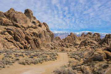 Fototapeta na wymiar Huge boulders form hills in the eastern Sierra Nevada mountains of California.