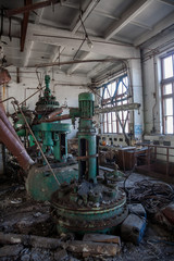 The abandoned chemical pharmacy vitamin plant with the remains of equipment