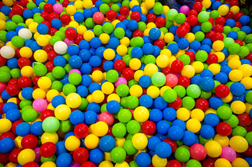 Fototapeta na wymiar The color ball colorfull for children. soft focus of colorful plastic ball in playground for kid