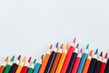 .Colored pencils on a white background