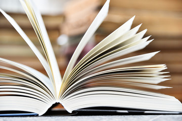 Hardcover book lying on the table in the library