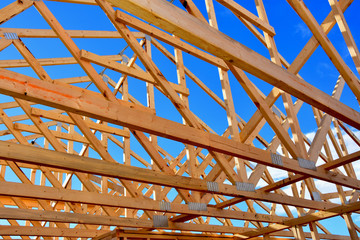 Wood frame residential structure under construction.