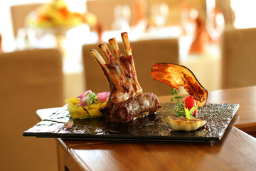 Baked ribs. Blurerred background.