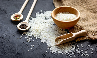 ingredients for paella on dark background