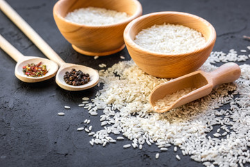ingredients for paella on dark background