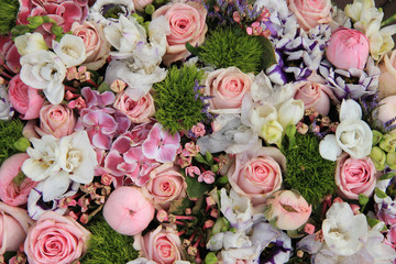 Mixed pink wedding arrangement