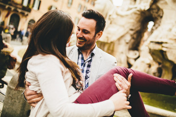 Loving couple having fun in Rome, Italy
