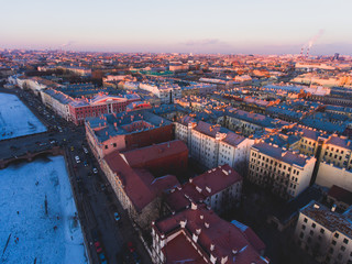 Obraz premium Beautiful super wide-angle summer aerial view of Saint-Petersburg, Russia with skyline and scenery beyond the city and Nevsky Prospect, seen from the quadrocopter air drone