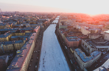 Fototapeta premium Beautiful super wide-angle summer aerial view of Saint-Petersburg, Russia with skyline and scenery beyond the city and Nevsky Prospect, seen from the quadrocopter air drone