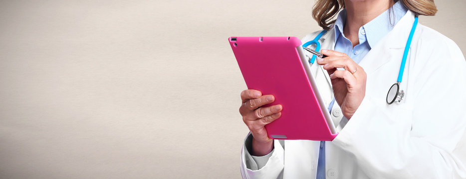 Doctor hands with tablet computer.