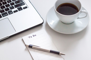 To Do List on Desk with Morning Coffee