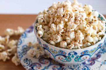 Colorful Bowl of Popcorn sprinkled with Cinnamon 