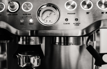 machine serving espresso coffee, close up