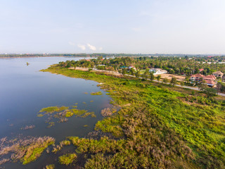 Fototapeta na wymiar Aerial view of tranquil lake near Pattaya city in morning