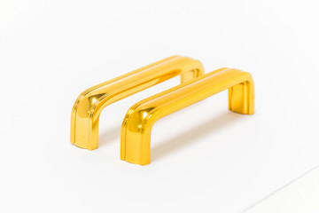 Fototapeta premium Furniture Handles gold on white background