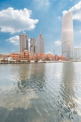 River And Modern Buildings Against Sky in Tianjin,China.