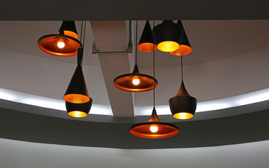 Decorative electric lamps hanging on the ceiling