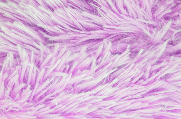 Closeup surface abstract fabric pattern at the purple fabric carpet at the floor of house texture background