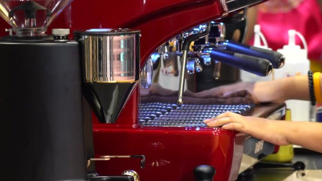 Cleaning the surface of a coffee machine