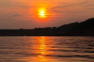 Obraz premium sunset on the river