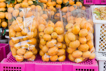 sweet Marian plum sold in Thai market