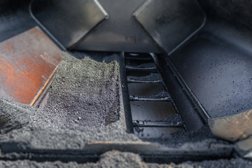 Asphalt road paver paiving machine closeup construction industry 