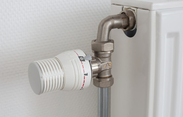 Temperature knob of heating radiator, used and dusty