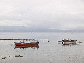 Indonesian fishing boats in the calm water