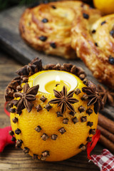Pomander ball and swedish buns in the background.