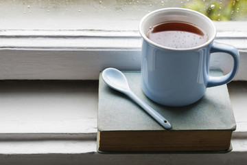 Mug of hot, steaming tea