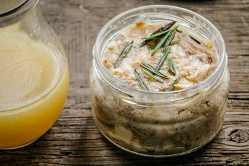 Boiled meat with rosemary (riyet) in a jar with broth - home preserves