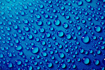 Water drops on the blue background