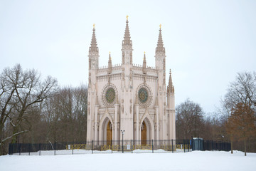 The St. Alexander Nevsky church in the Alexandria park of a gloomy February day. Peterhof