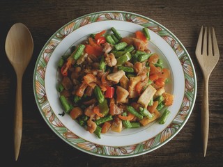 Vintage style Thai traditional and Chinese food stir fried vegetable in brown sauce with dried shrimp