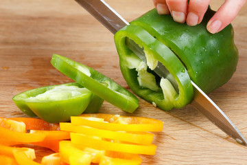 Colorful Bell pepper on cutting board