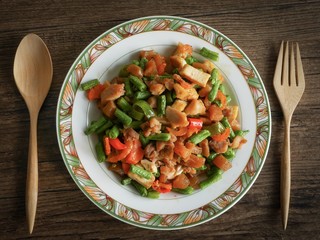 Vintage style Thai traditional and Chinese food stir fried vegetable in brown sauce with dried shrimp