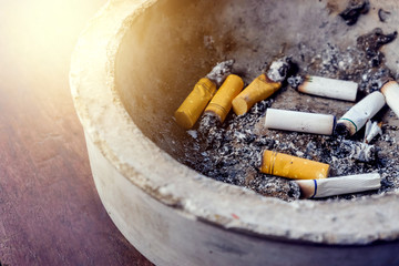 Bad addiction. Ashtray and cigarettes
