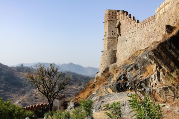 Fortification tower and wall of Kumbalgarh Fort, an impressive big Mewar fortress in Rajasthan, India 