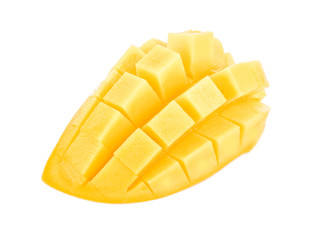 Mango slice cut to cubes close-up isolated on white background