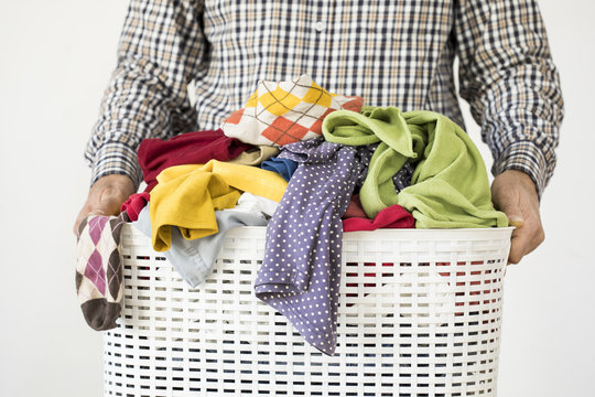 Man Hands Holding Laundry Basket