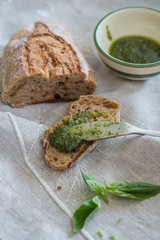 whole grain bread with fresh basil pesto