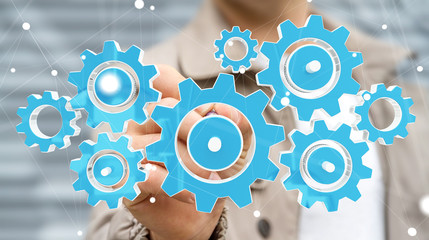 Businessman touching colorful gear icons with his finger 3D rendering