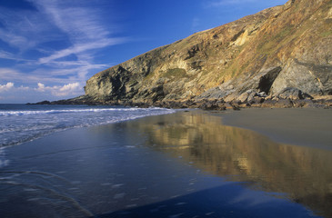 Fototapeta na wymiar Reflections Tregardock Beach Cornwall